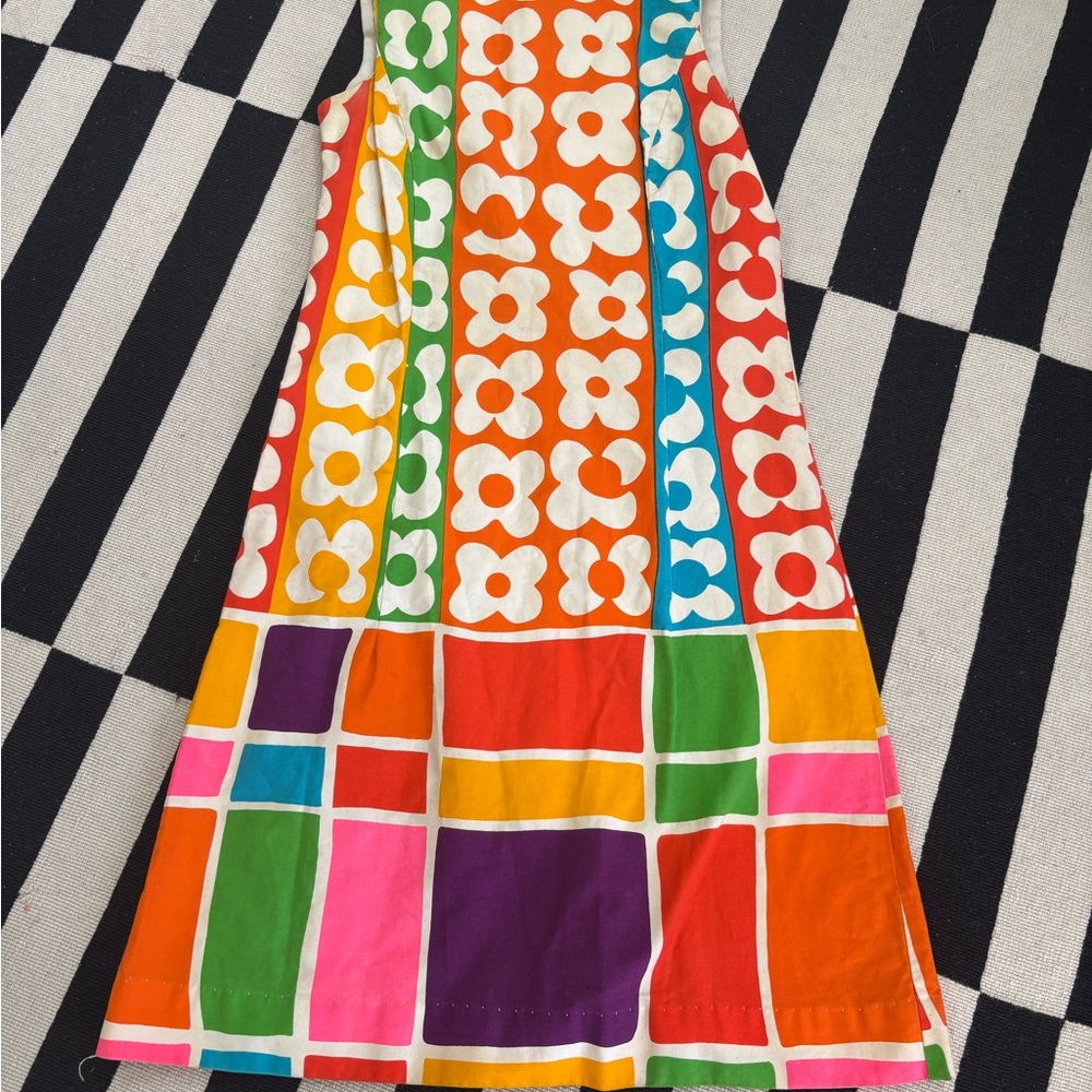 Miss Elaine White and Orange Garment